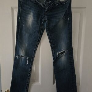 Distressed Blue Jeans